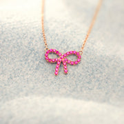 Pixie Pink Pavé Bow Necklace Storyjewellery