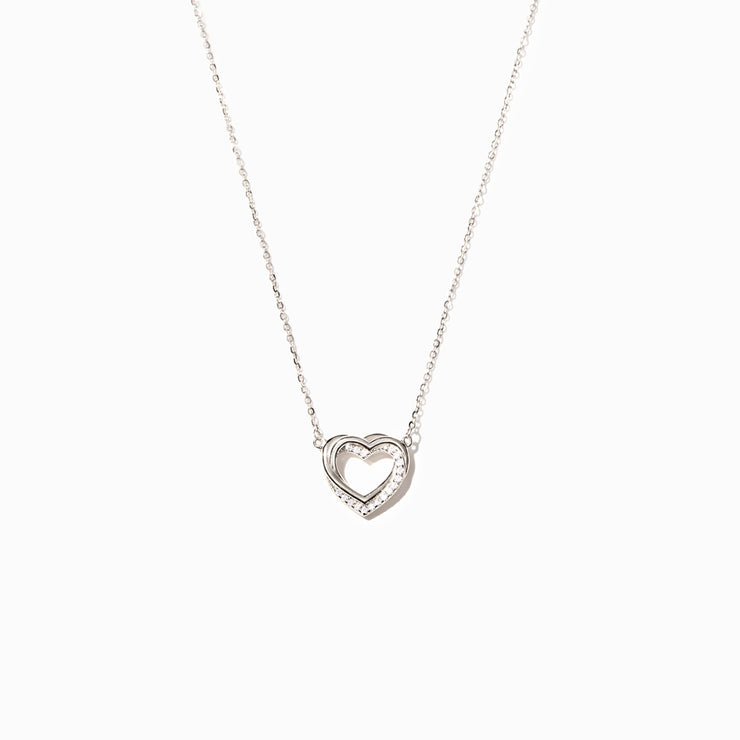 Tiny Interlocking Hearts Necklace in Silver | Lisa Angel