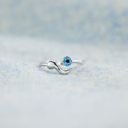 Evil Eye Ring, Italian Horn Ring in silver color with environmental background